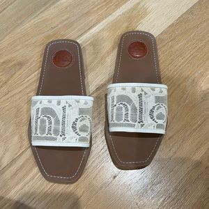 Chloe woody lace slides